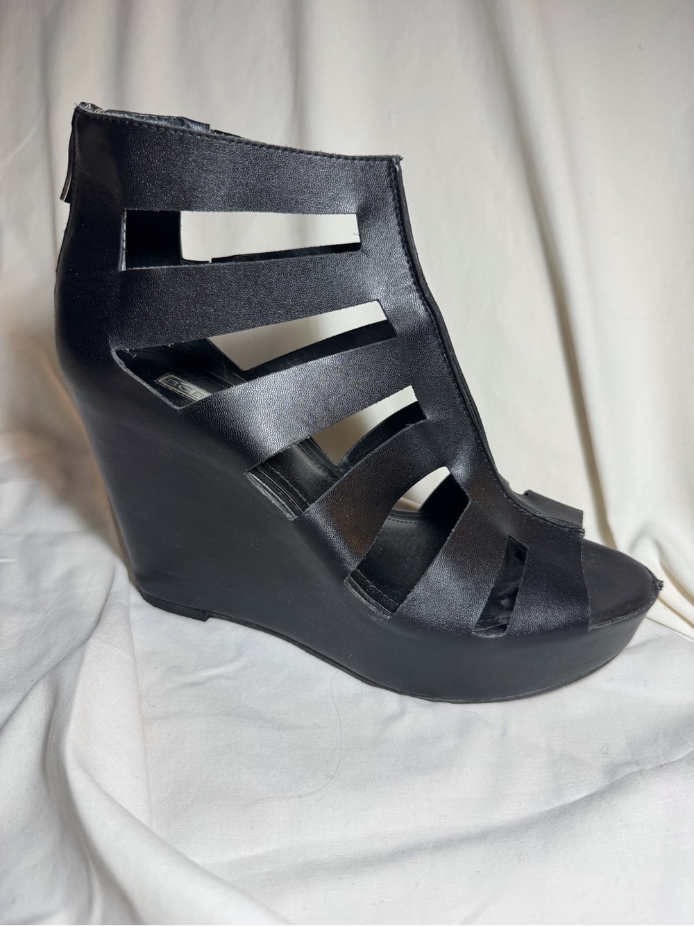 BCBGeneration Black Cutout Strappy Wedge Sandals